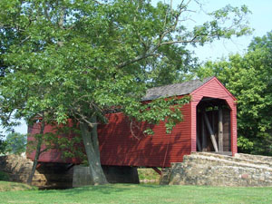 Historic covered bridge timber frame restoration.