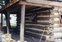 Log cabin reproduction, hand hewn logs.