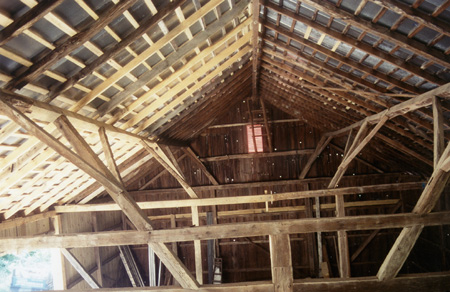Dahlgren Street barn restoration project, finished view of interior framing.