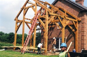 Assembled frame, a harmonious period style addition to a brick residence.