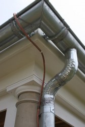 Gutters and Downspouts are Soldered For a Watertight Seal -- Note Braided Copper Lightning Suppression System Conductor