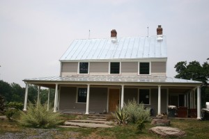 Roof Complete and Lightning Suppression System Installed -- Galvanized Metal will Dull to a Mild Grey Within a Month