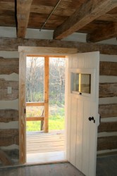 Doors are made in the style of many early period entries, and are hung on reproduction Victorian era hardware.
