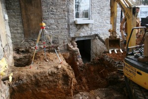 We'll excavate deeply enough to provide a secure footing well below frost and below the adjacent areaway floor.