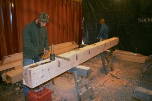 Cutting a large floor beam.  The pockets along each edge will hold floor joists.