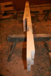 The primary building axis is long enough that we chose to splice the ridge timber with a double bladed scarf joint which incorporates a wedged key.