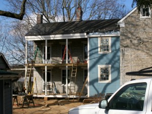 Siding complete and New Porch Posts Installed
